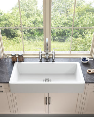 Bridge Kitchen Faucet with Pull-Down Sprayhead in Spot