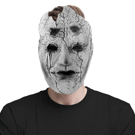 Realistic cracked stone mask with terrifying texture, perfect for Halloween costume. Features elastic rubber bands for secure fit. Available at BoltBuy Halloween collection