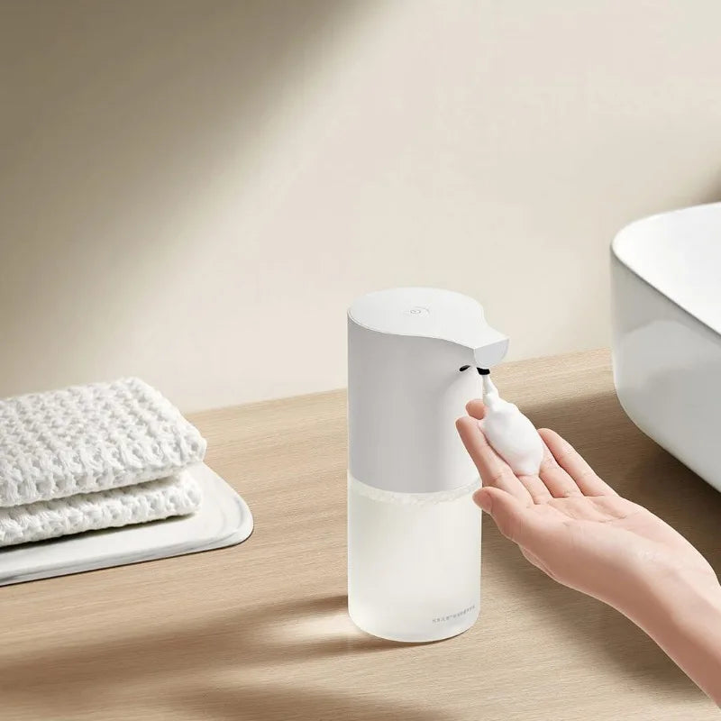 Automatic soap foam dispenser with touchless sensor, sleek design. ideal for hygienic hand washing, available at Boltbuy.com