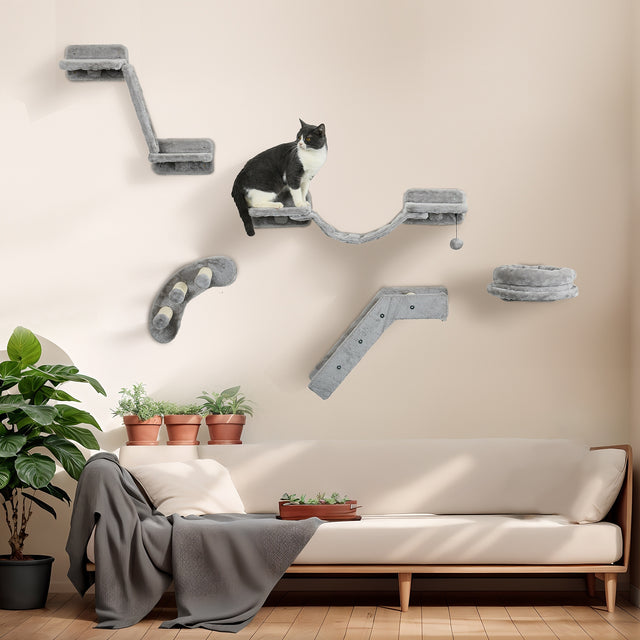 Wall-mounted modular cat furniture set featuring a hammock, platforms, and scratchers, designed to enhance vertical play and relaxation for your cat, blending seamlessly with modern home decor – available at BoltBuy.com.